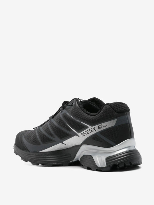 Black sneakers, back view