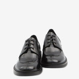 Black derby, front view