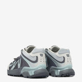 Grey sneakers, back view