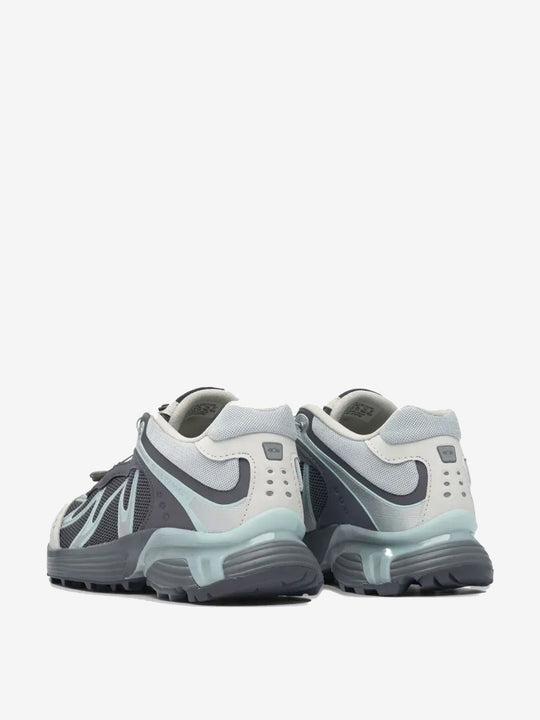 Grey sneakers, back view