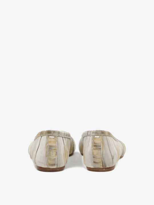 Tan shoes, back view