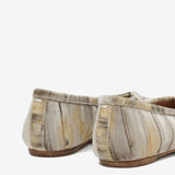 Close up of the tan shoes, showing texture of the viscose fabric