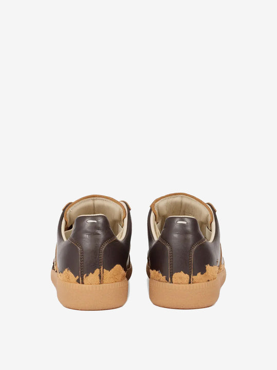 Brown sneakers, back view