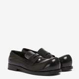 Black loafer, side view