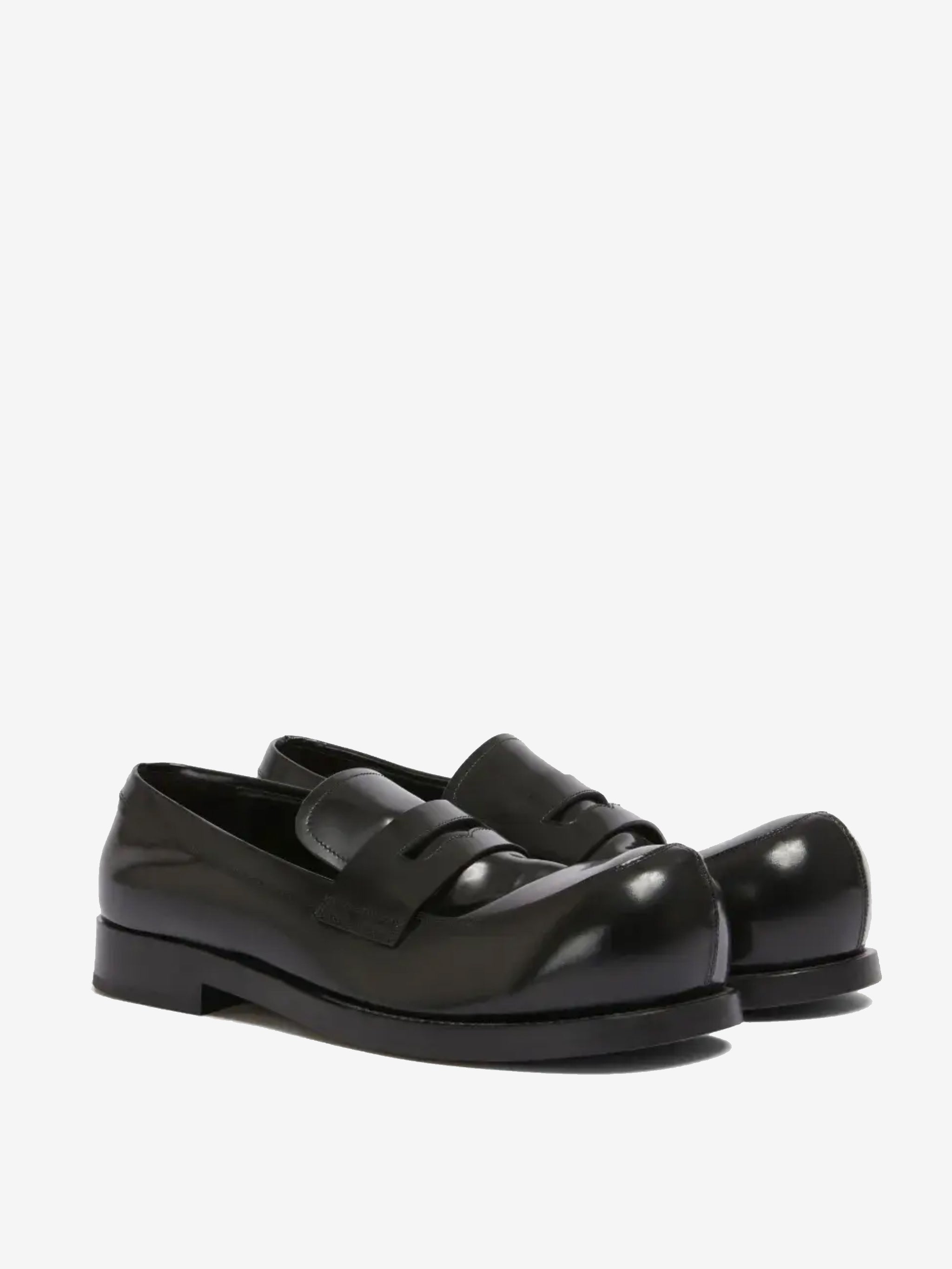 Black loafer, side view
