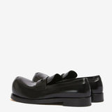 Black loafer, back view