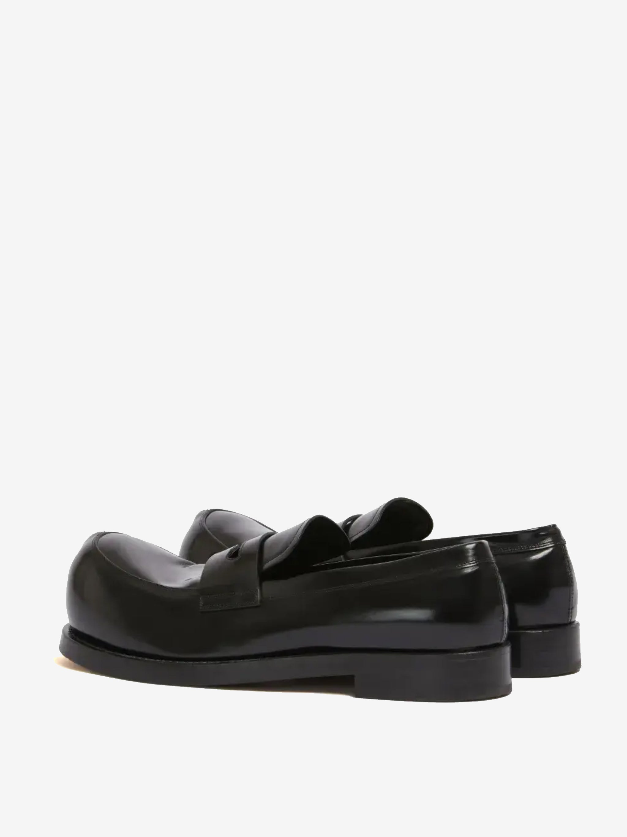 Black loafer, back view