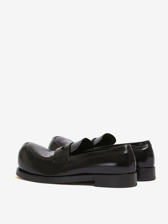 Black loafer, back view