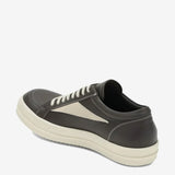 Grey sneakers, back view