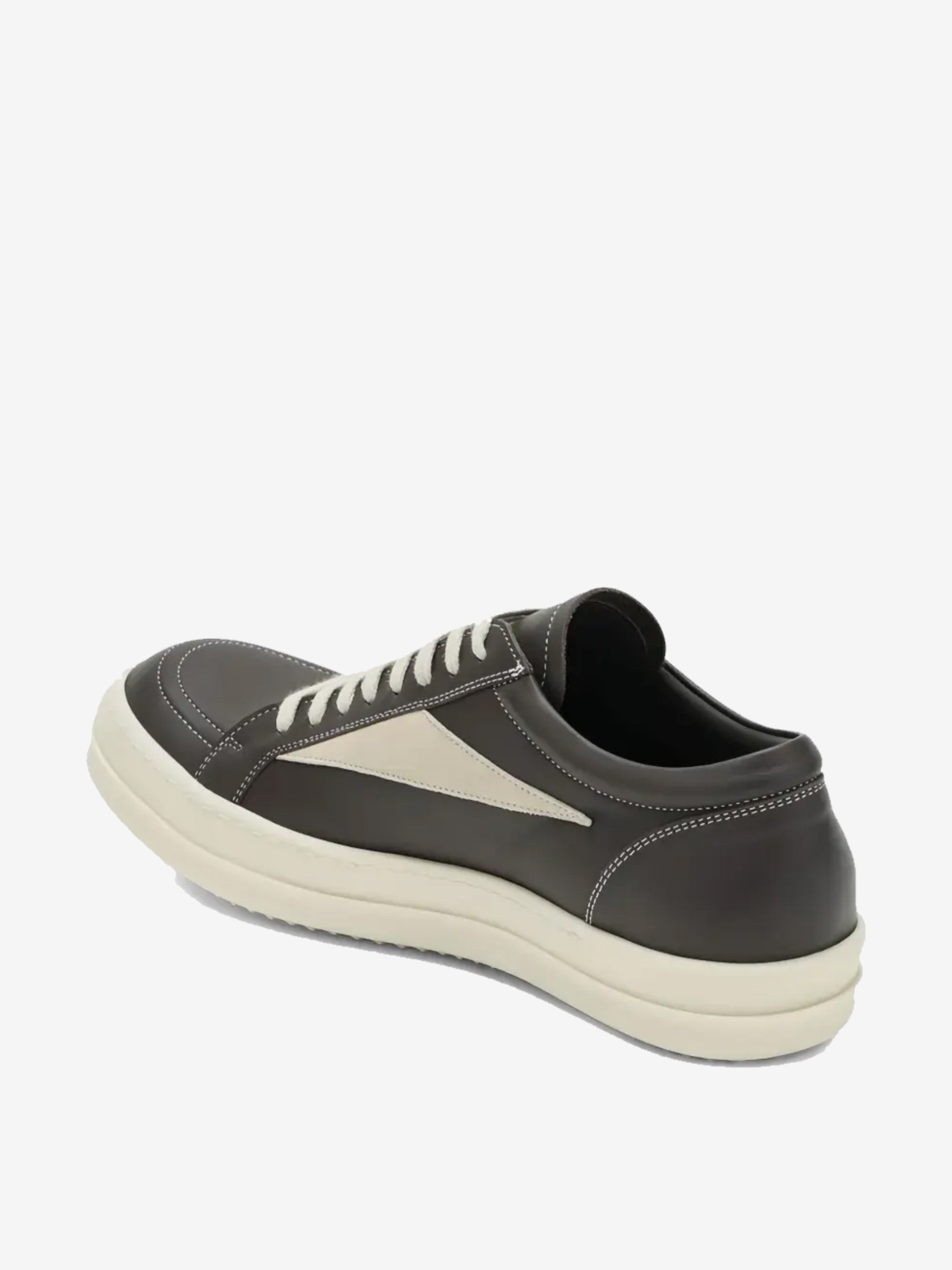 Grey sneakers, back view