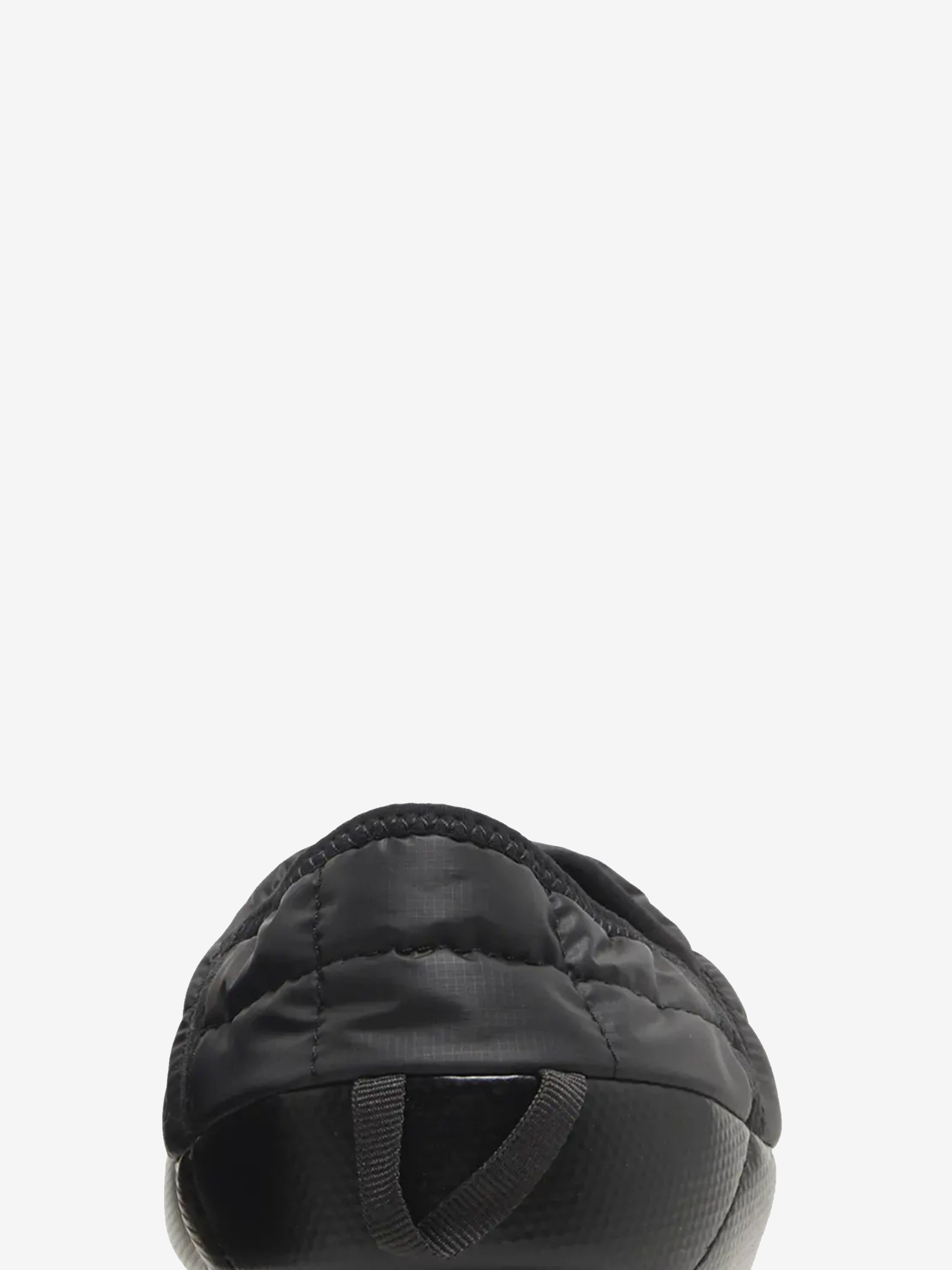 Close up of the black sneakers, showing texture of the polyester fabric