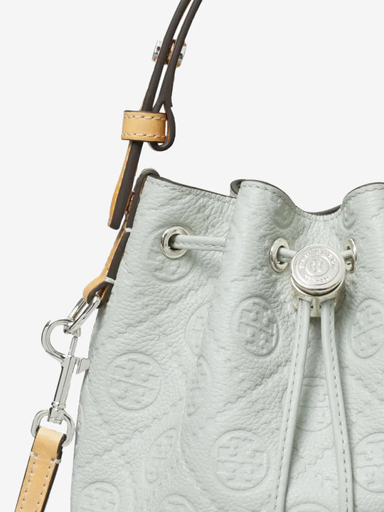 Close up of the grey bag, showing texture of the leather fabric