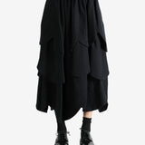 Black skirt worn by a person, showing the skirt's fit