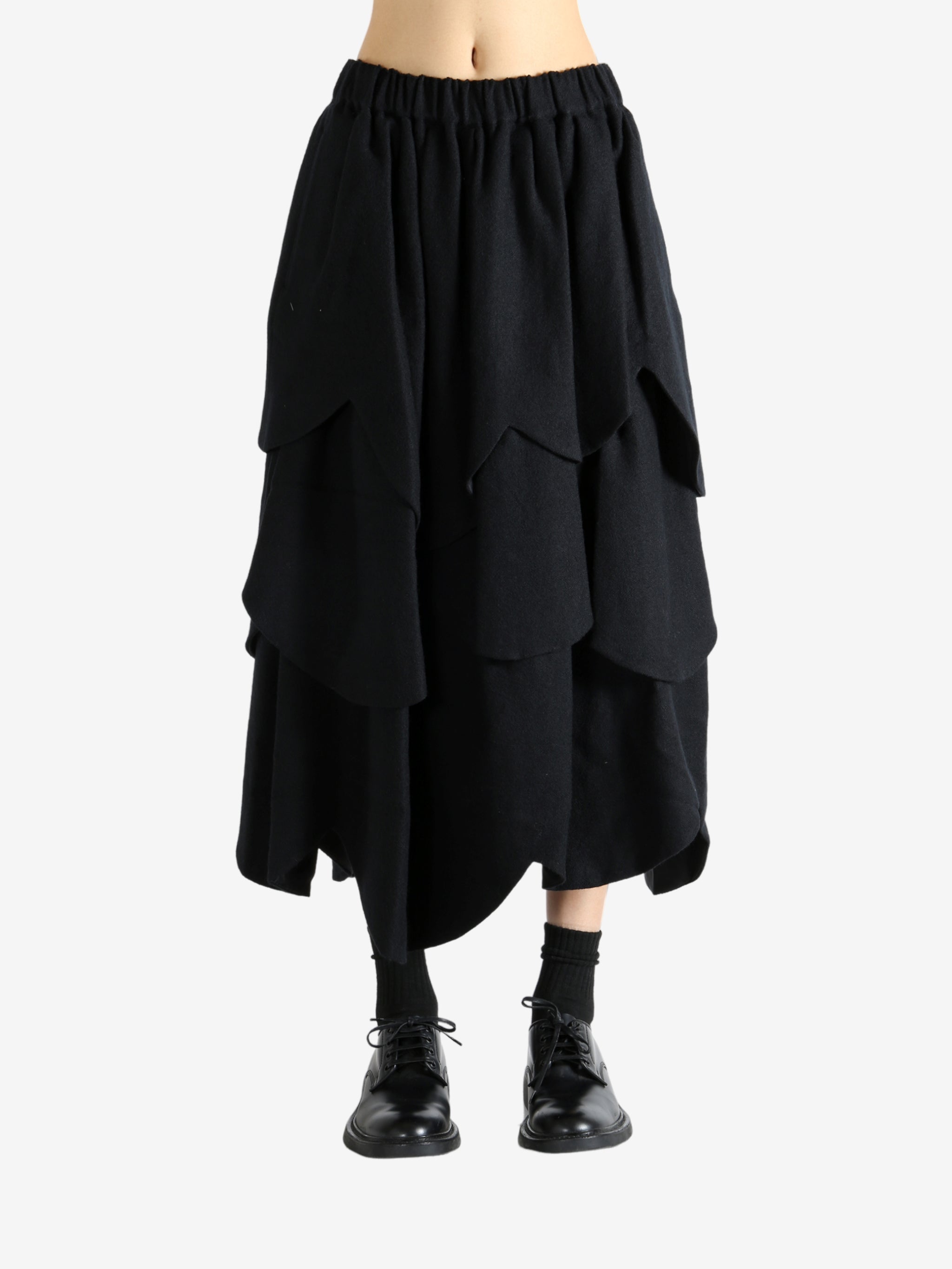 Black skirt worn by a person, showing the skirt's fit