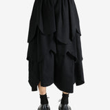 Black skirt worn by a person, showing the skirt's fit