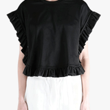 Black t-shirt worn by a person, showing the t-shirt fit