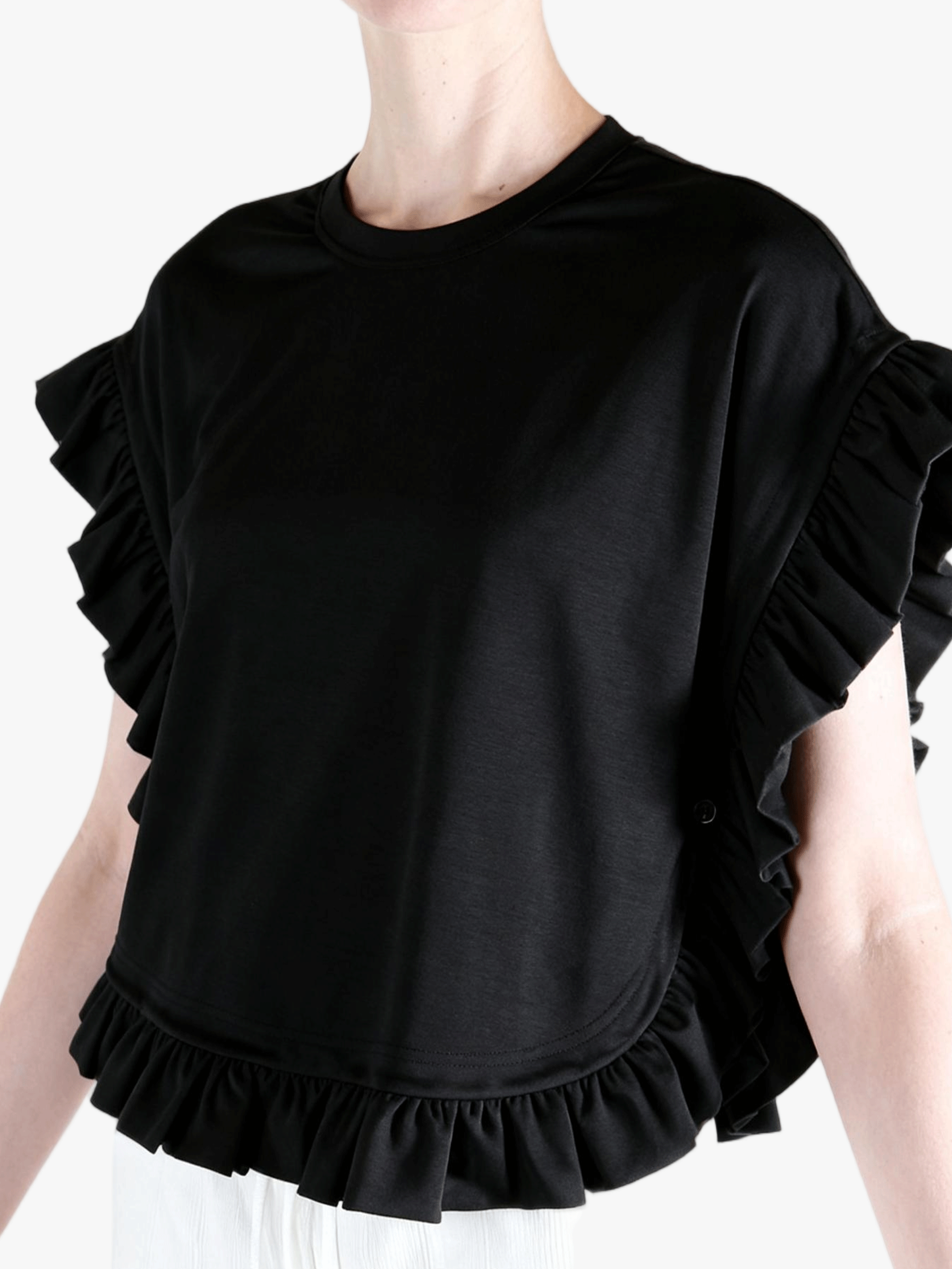 Black t-shirt worn by a person, side view