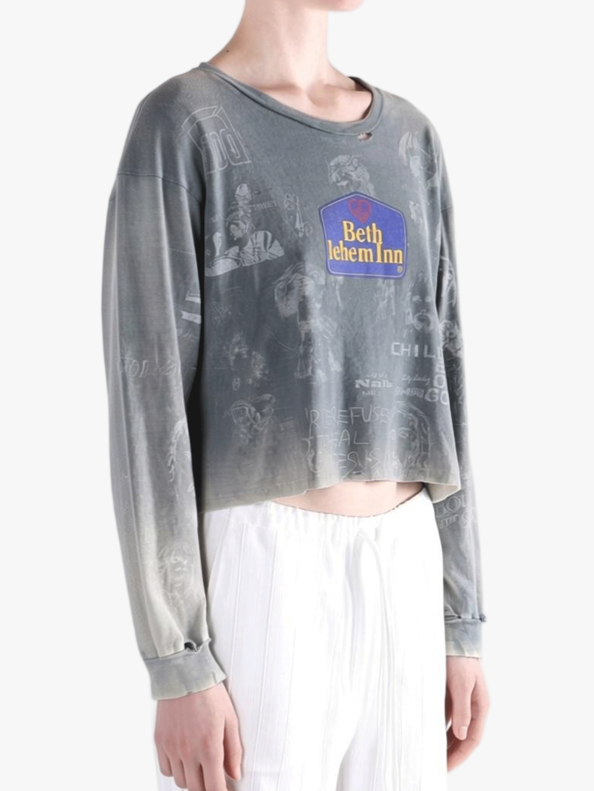 Black t-shirt worn by a person, side view