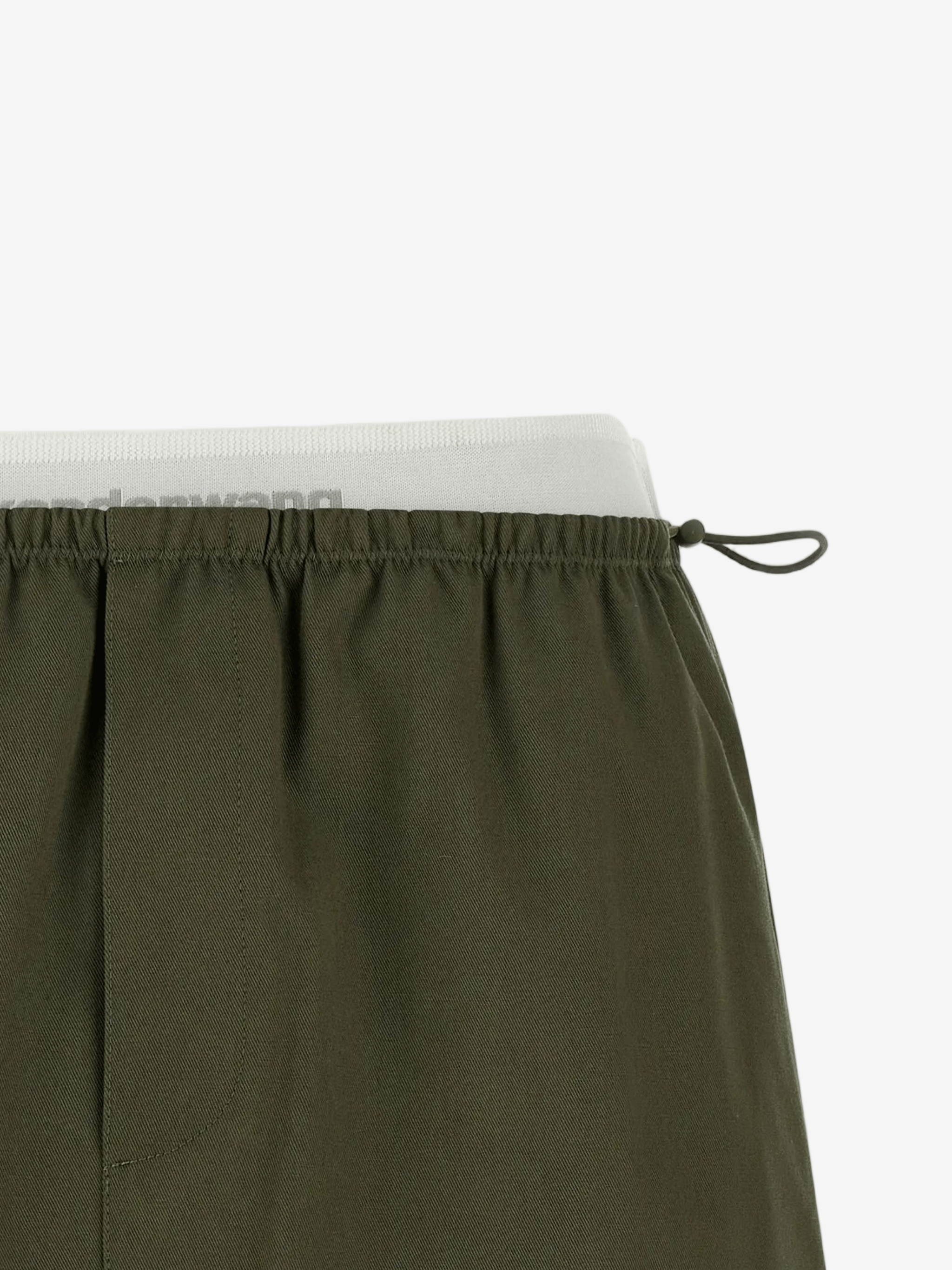 Close up of green skirts, showing texture of the Cotton fabric