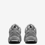 Grey sneakers, back view