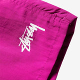 Close up of pink shorts, showing texture of the nylon fabric