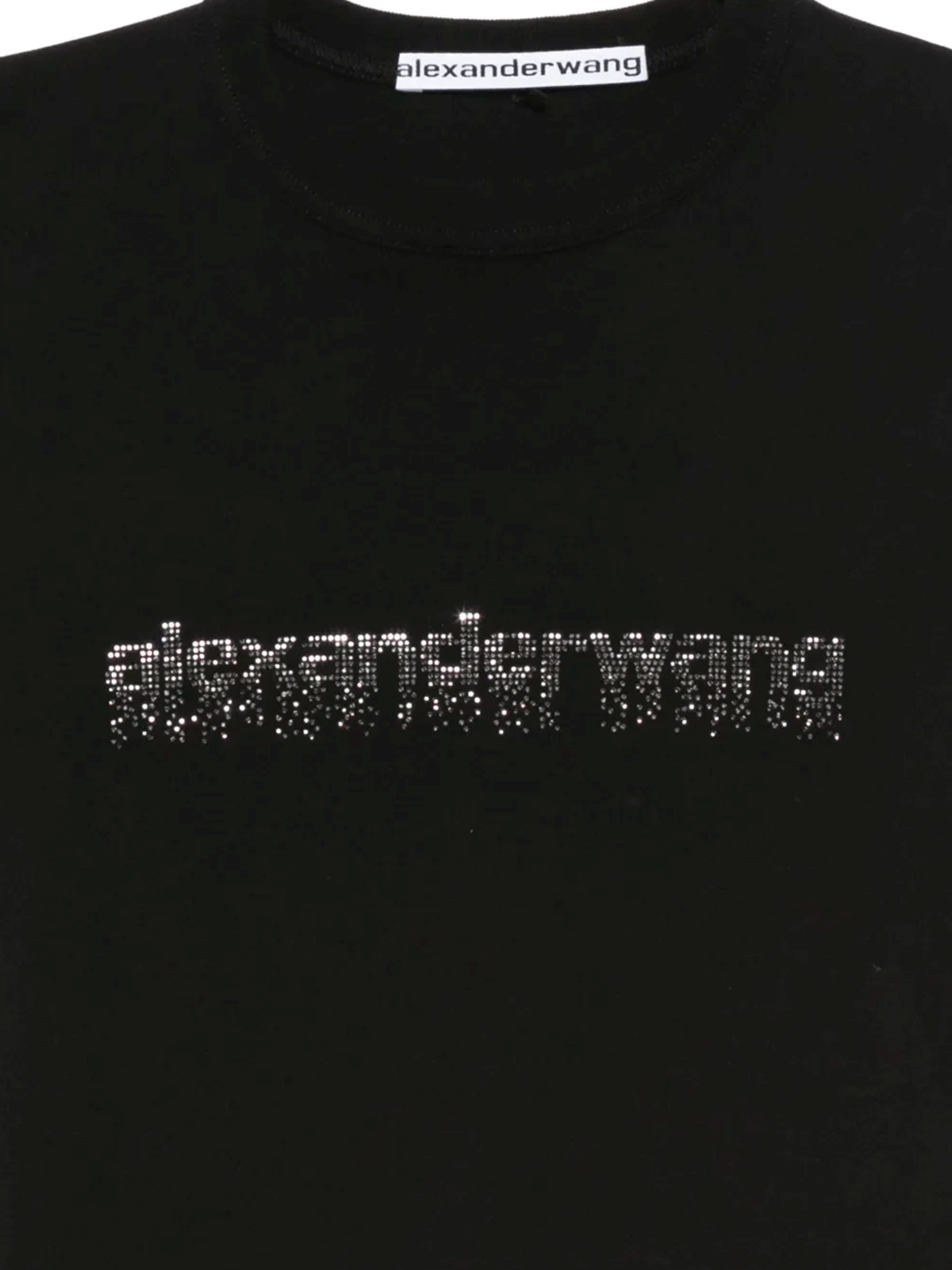 Close up of black t-shirt, showing texture of the Cotton fabric