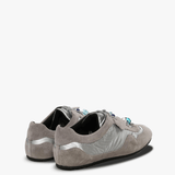 Grey sneakers, side view