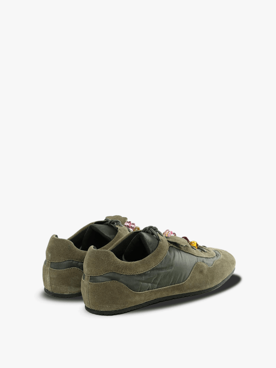 Green sneakers, side view