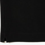 Close up of the black shirt, showing texture of the cotton fabric