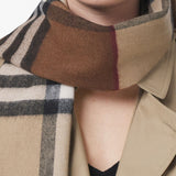 Close up of brown scarf,showing texture of the cotton fabric.
