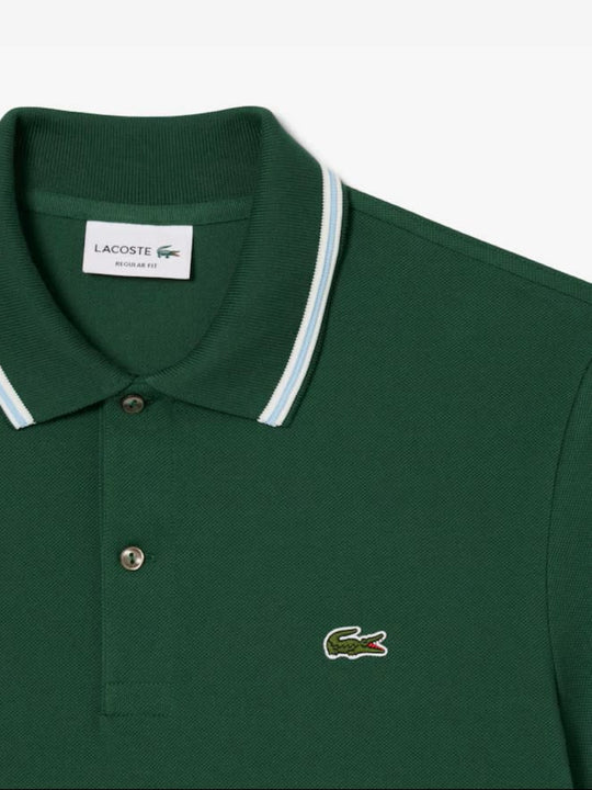 Close up of the green shirt, showing texture of the cotton fabric