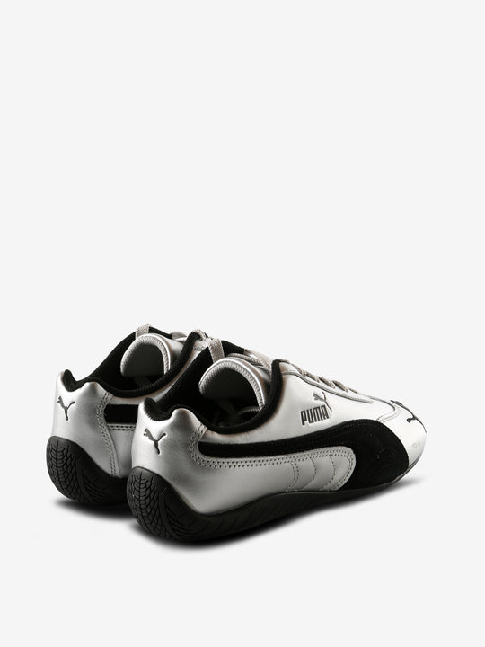 Grey sneakers, back view