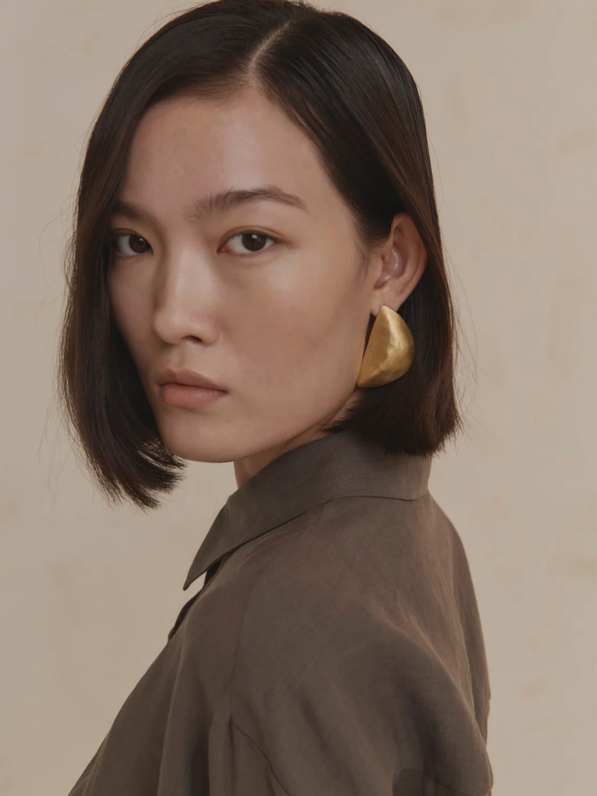 Close up of purple shirt, showing texture of the ramie fabric