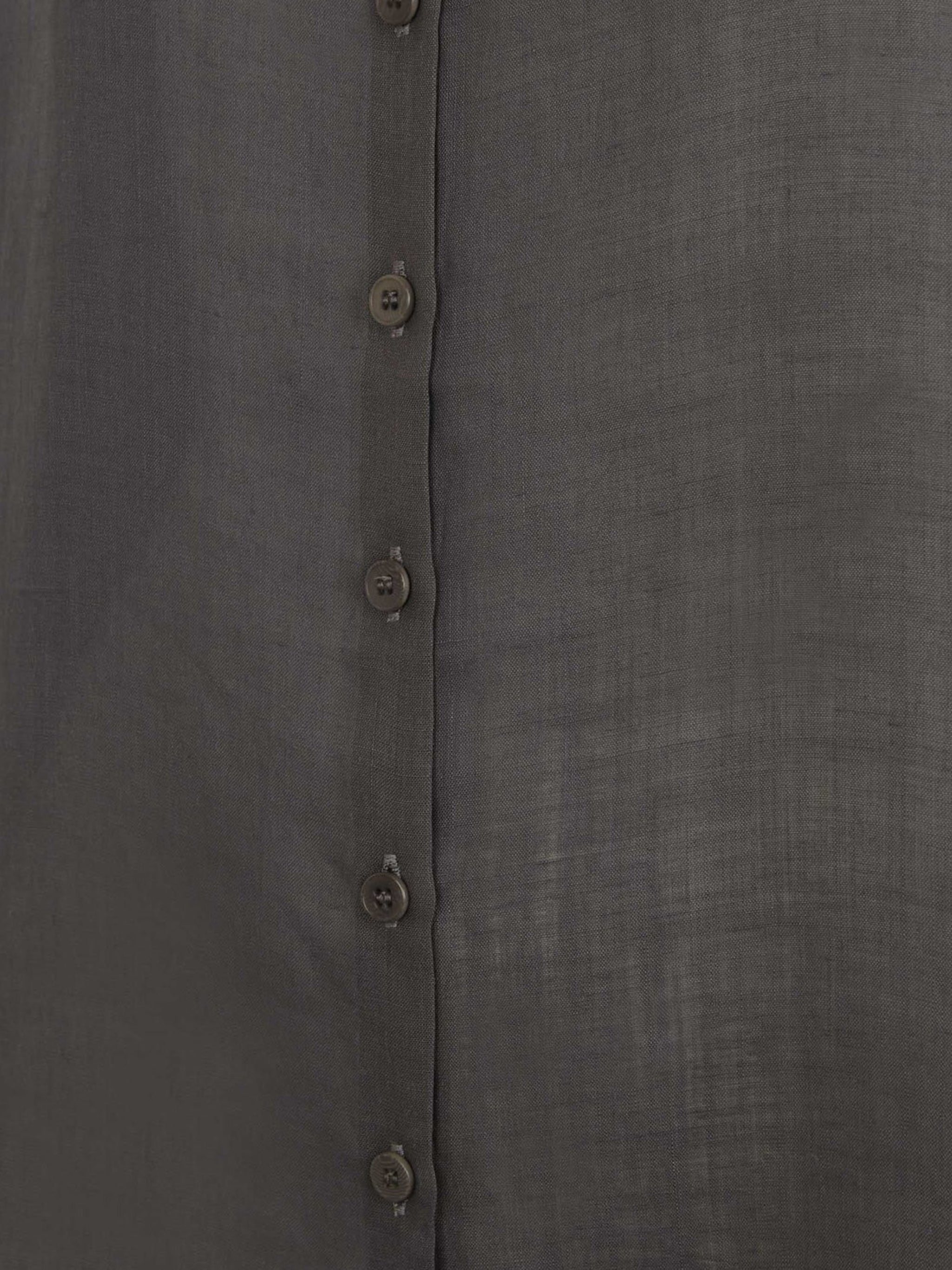 Close up of purple shirt, showing texture of the ramie fabric