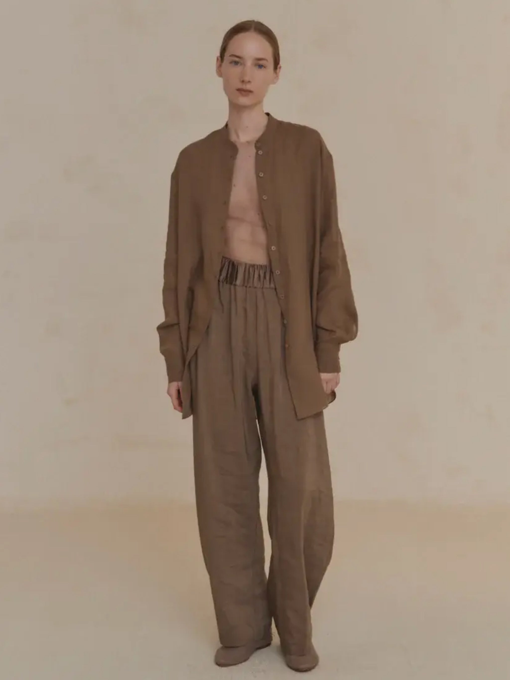 Tan pant worn by a person, showing the pant's fit