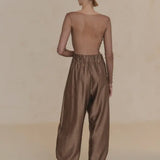 Tan pant worn by a person, showing the pant's fit