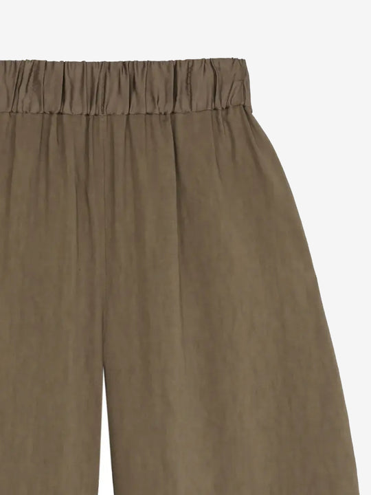Close up of tan pant, showing texture of the viscose fabric