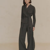 Green jacket worn by a person, showing the jacket's fit