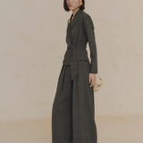 Green jacket worn by a person, showing the jacket's fit