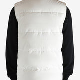 White vest worn by a person, showing the vest fit