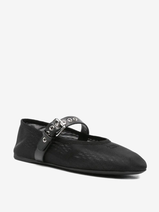 Black flats, side view