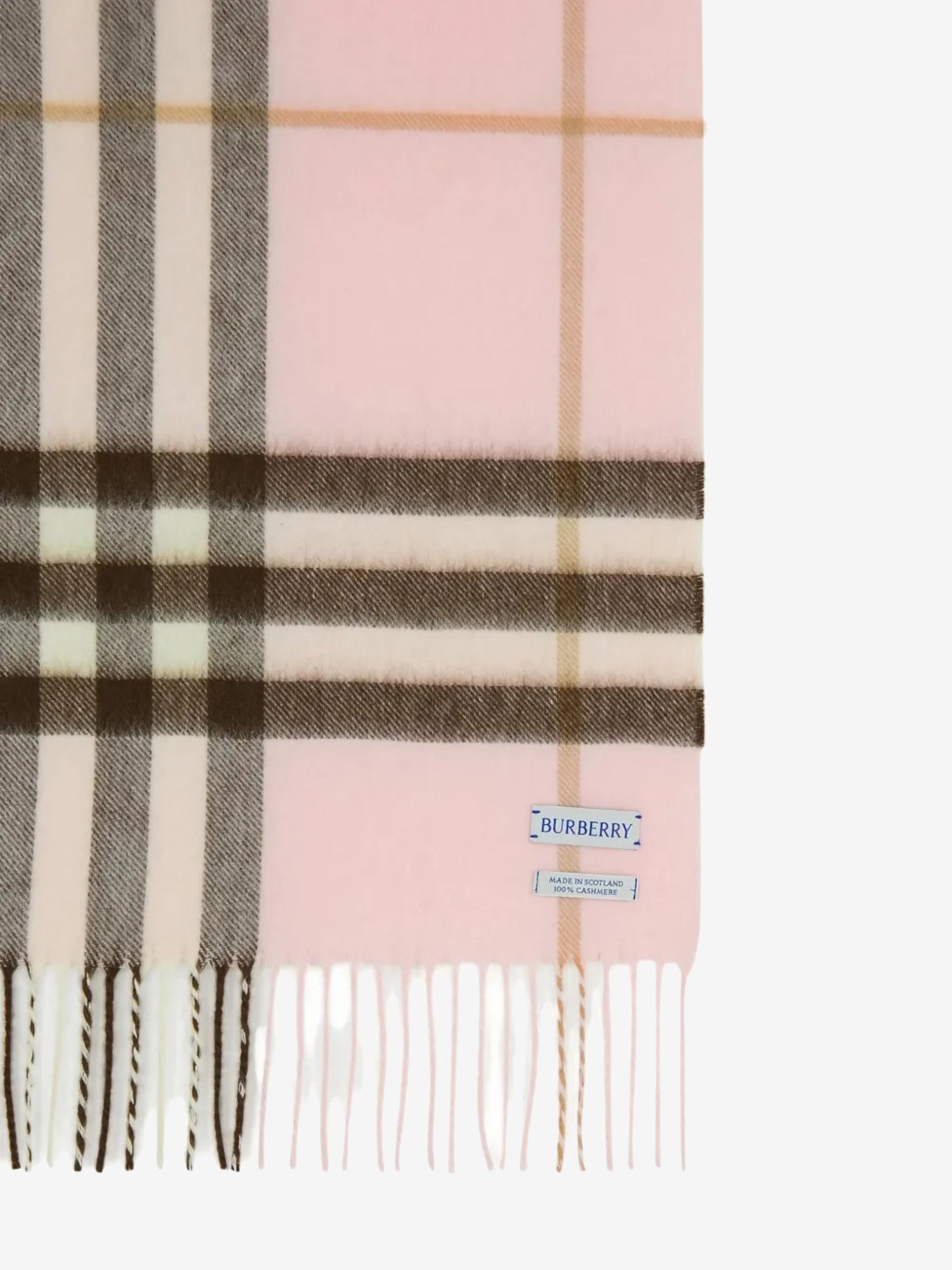 Close up of the pink scarf, showing texture of the cashmere fabric