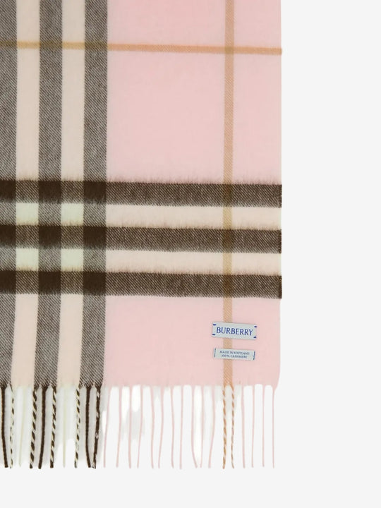 Close up of the pink scarf, showing texture of the cashmere fabric