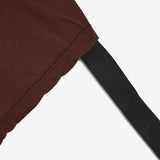 Close up of burgundy t-shirts , showing texture of the organic cotton fabric