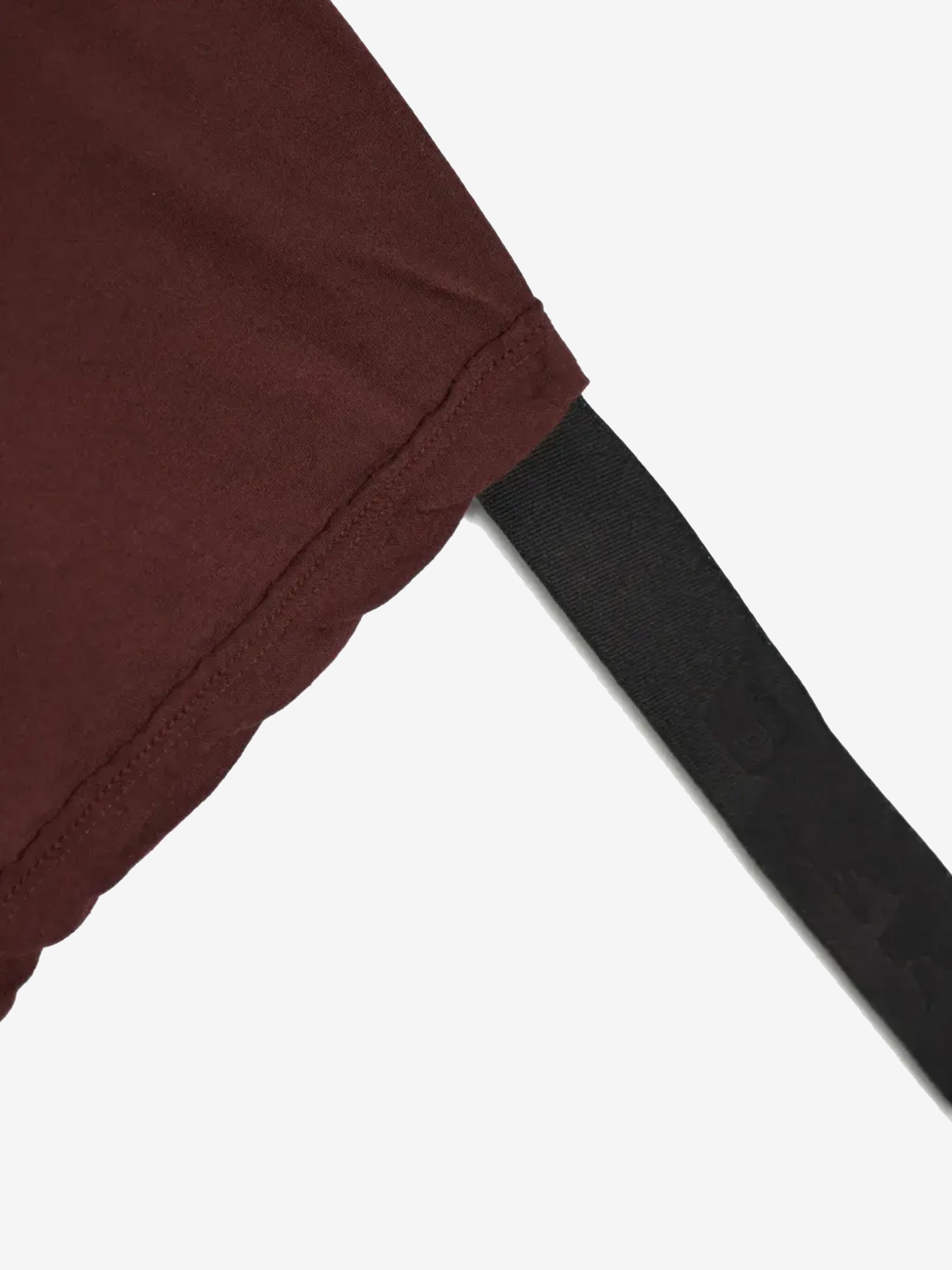 Close up of burgundy t-shirts , showing texture of the organic cotton fabric