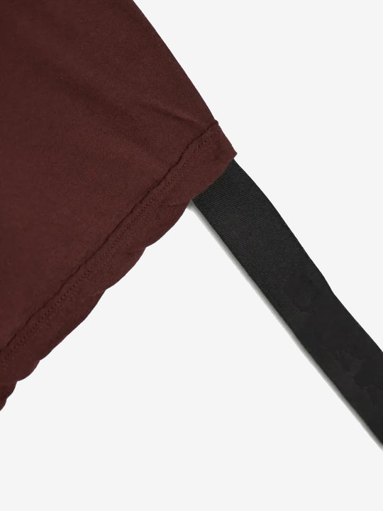 Close up of burgundy t-shirts , showing texture of the organic cotton fabric