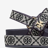 Close-up of grey sandal,showing texture of the rubber fabric.