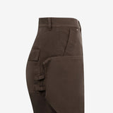 Close up of the brown pants, showing texture of the cotton fabric