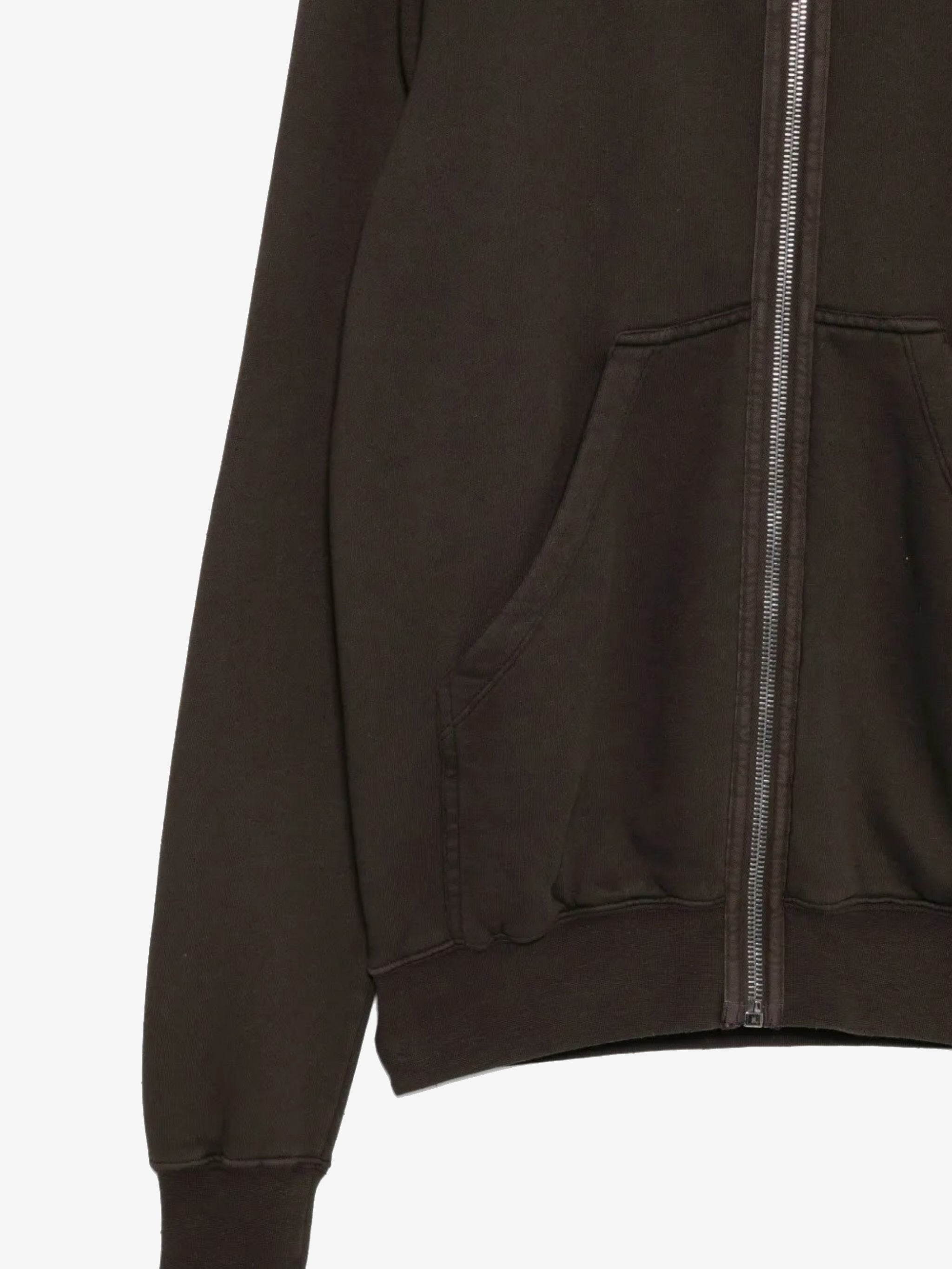 Close up of the brown hoodie, showing texture of the cotton fabric