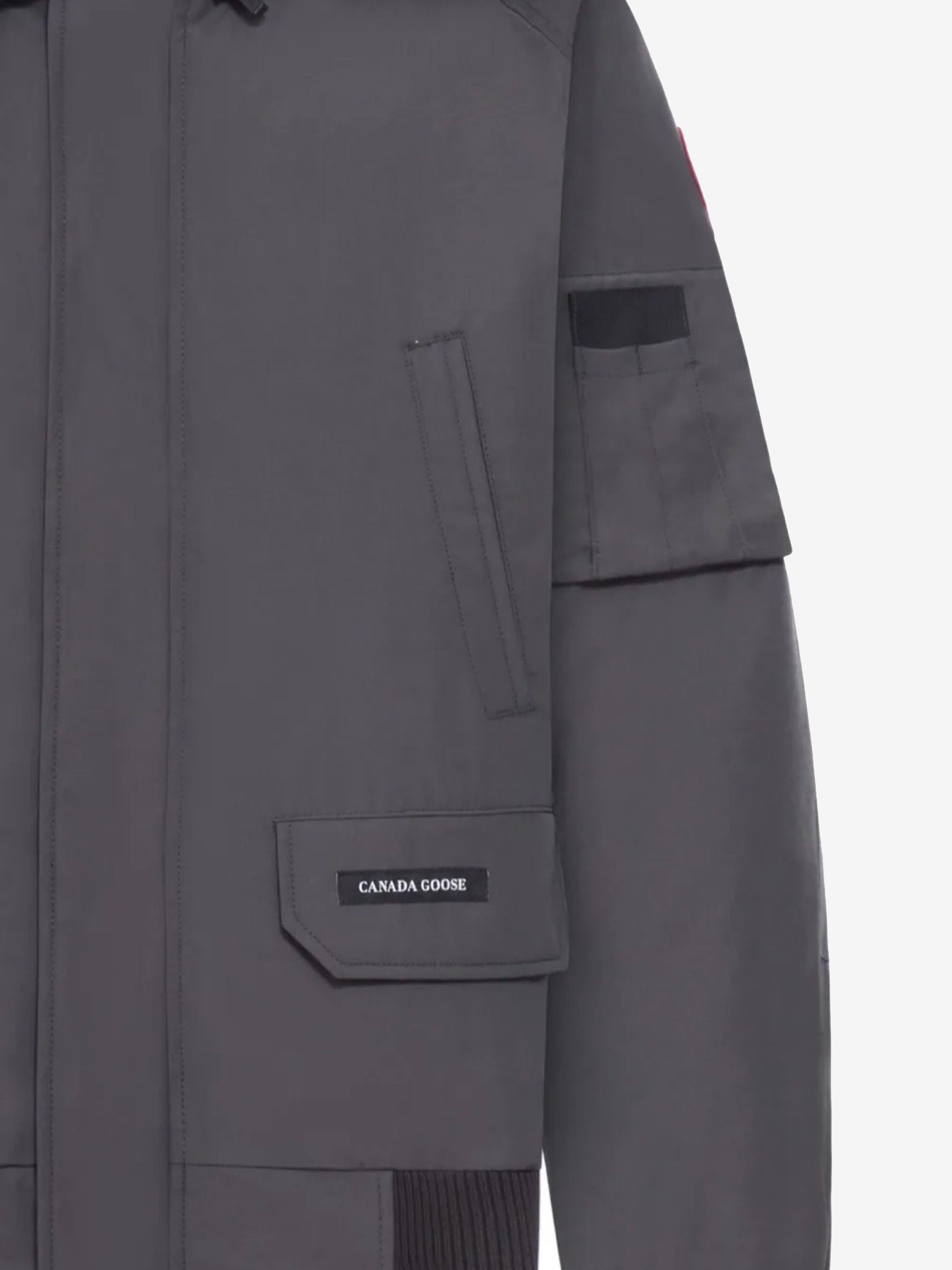 Close up of the grey jacket, showing texture of the polyester and cotton fabric